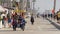 People walking, waterfront promenade beachfront boardwalk. Ocean beach near Los Angeles, California USA