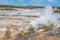 People walking on wooden walkways in Norris Geyser Basin in Yellowstone National Park