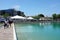 People on the walkway bisecting Peace Lake at Soka University during the 18th annual International Festival