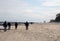 People wandering on the Baltic Sea beach