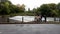 People watch as  Salmon leap a weir