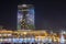 People watch beautiful dancing fountain illuminated at night in new Tashkent City Park