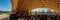 People watch an event inside the Bionic Wooden Pavillion at the 2019 Federal Garden Show BUGA in Heilbronn, Germany