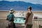 People watching a map near Death Valley