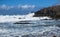 People watching massive storm waves El Cotillo beach, Fuerteventura, Canary Islands, Spain