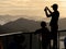 People watching the sunset in the mountain Tapyas at Coron , Palawan