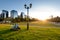 People watching the sunset at Parque Araucano, the main park in Las Condes district, surrounded by office buildings of Nueva Las C