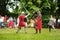 People wearing knight costumes fight during historical reenactment on annual Medieval Festival, held in Trakai Peninsular Castle