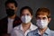 People wearing surgical masks looking worried concerned with pandemic outbreak Coronavirus covid-19situation