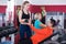 People weightlifting training in modern health club