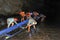 People who move their canoe in the Tham Kong Lo cave