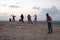 People on the windy Sagres coastline