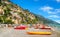 People on yhe beach on Positano resort village. Amalfi coast. Campania region, Italy