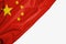 Peoples Republic of China flag of fabric with copyspace for your text on white background