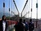 Peoples walking through a Lakshman Jhula Bridge, Rishikesh, India