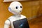 Pepper - the japanese semi humanoid robot assistant closeup, portrait . Artificial intelligence, modern human like robotics