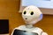 Pepper - the japanese semi humanoid robot assistant closeup, portrait . Artificial intelligence, modern human like robotics