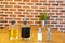 Pepper mill and salt shaker, with bottles of oil and vinegar, on a bamboo table