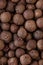 Peppercorn background. Dry black pepper seeds. Top view. Flat design. Macro spice background