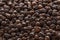 Peppercorn background. Dry black pepper seeds. Top view. Flat design. Macro spice background