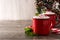 Peppermint coffee mocha decorated with candy canes for Christmas on wooden table