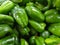 Peppers piled up on supermarket counter