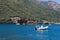 Perast in hte Bay of Kotor with views on the rising mountains and the church of the lady of the Rocks