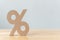 Percentage sign symbol icon wooden on wood table