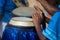 Percussionist hands playing atabaque. musical rhythm. African music