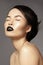 Perfect asian model with fashion make-up and hairstyle. Beauty halloween style with black lips makeup. Catwalk visage