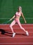 perfect body. healthy lifestyle. workout on outdoor stadium. physical training. athletic lady.