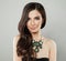 Perfect Brunette Woman with Event Hairstyle and Green Jewelry