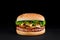 Perfect burger with beef cutlet, mushrooms, lettuce isolated at black background