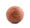 A perfect coco over the radiant background. A brown coconut with scratchy texture. Tasty healthful nuts for diets.