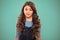 Perfect curling hair. Teaching healthy hair care habits. Kid girl long healthy shiny hair. Kid happy cute face with