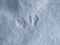 Perfect footprints of four paws of Eurasian Red Squirrel (Sciurus vulgaris) on ground covered with soft snow in winter