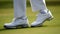 Perfect form, A close-up of golfers legs during a swing
