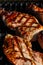 Perfect grill marks on juicy pork chops. Calgary, Alberta, Canada