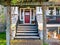 A perfect neighbourhood. Porch and entrance of a nice residential house