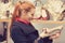 Perfect pair! Woman looking at high heel shoes while shopping in department store