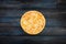 Perfect pizza margarita on a dark wooden background. Top view center orientation