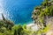 The perfect secret beach: sand beach and turquoise sea, surrounded by luxuriant vegetation, Positano, Mediterranean Sea
