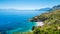 The perfect secret beach: white pebbles beach and turquoise sea at San Vito Lo Capo, Sicily, Italy