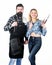 Perfect for a summer cookout. Couple of bearded man and pretty woman holding BBQ set. BBQ is a cooking method. Happy