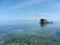 Perfect sunny day above the reef at low tide, transparent water makes reef visible