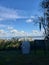 Perfect sunny Florida lake marsh grass clouds fishing pier