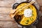 Perfect Tamale Pie Recipe - Rich zesty beef filling topped with fluffy corn bread closeup. horizontal top view