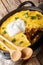 Perfect Tamale Pie Recipe - Rich zesty beef filling topped with fluffy corn bread closeup. vertical