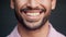 Perfect teeth of happy smiling man feeling cheerful and satisfied. Closeup mouth of confident and bearded male