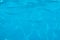 Perfect texture of clear blue water in the swimming pool, ocean or sea. Top view. copy space. shimmering water. Abstract